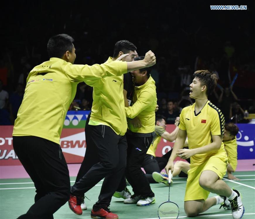 Team China celebrate after winning the final against team Japan at the Thomas Cup badminton tournament in Bangkok, Thailand, on May 27, 2018. Team China won the final 3-1 and claimed the title of the event. (Xinhua/Wang Shen)