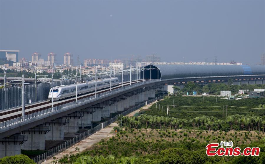 A high-speed train makes a pilot run from Jiangmen City to Zhanjiang City in Guangdong Province, May 28, 2018. Simulation exercises including malfunction and emergency case handling during the pilot run will provide scientific evidence for further operation. (Photo: China News Service/Yang Sheng)