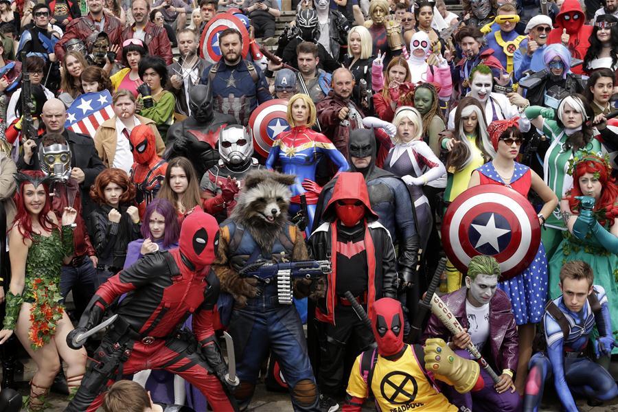People dressed in costumes pose for a photo at the MCM Comic Con at the ExCel center in London, Britain, on May 27, 2018. The MCM Comic Con was held in London from May 25 to May 27, attacting lots of comic fans to the popular culture gathering. (Xinhua/Tim Ireland)