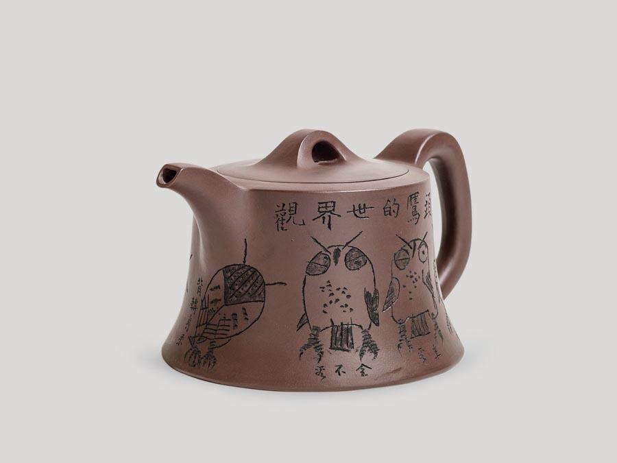 Artist Huang Yongyu is known for his great vigor and versatility. He paints, writes, designs, creates prints and draws comics. And at 94, he has fallen into a new habit of art creation: carving figures on earthen zisha teapots. (Photo provided to China Daily)