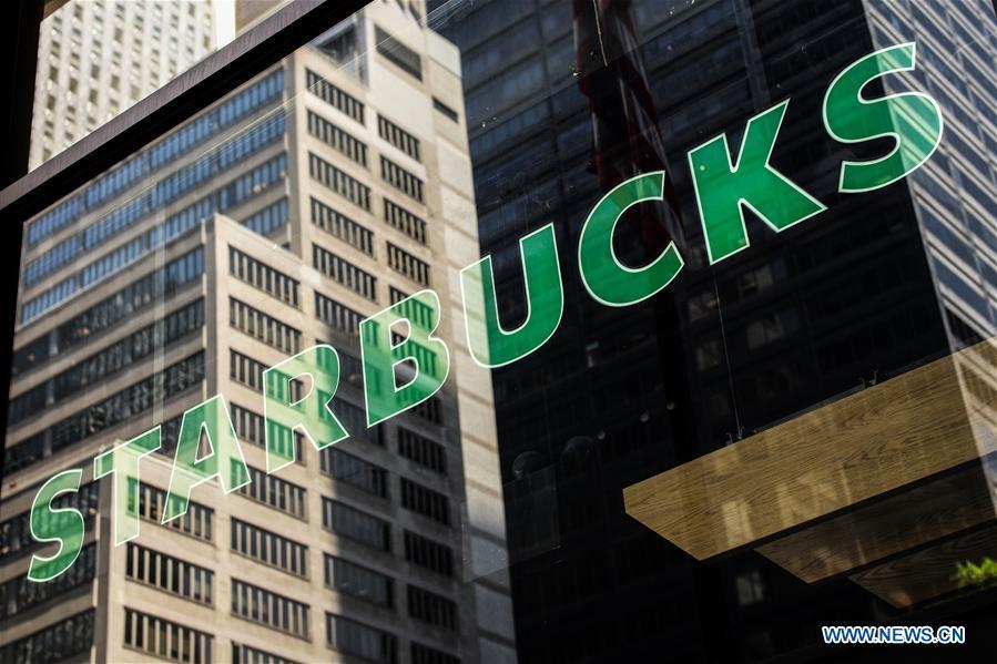 A Starbucks logo is pictured in Manhattan, New York, the United States, May 29, 2018. Starbucks closed about 8,000 company-owned stores in the United States on Tuesday afternoon to offer nearly 175,000 employees a mandatory anti-bias training. (Xinhua/Li Muzi)