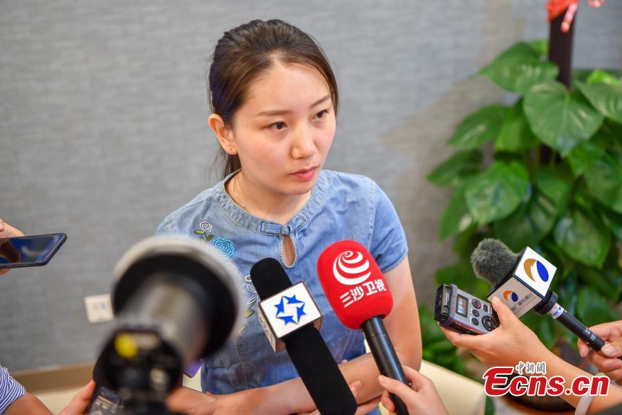 Shi Jiayu, a 25-year-old woman from Beijing, talks to reporters after becoming the first on the Chinese mainland to receive Gardasil 9, a vaccine for human papillomavirus (HPV), at United Family Healthcare in Boao, South China’s Hainan Province, May 30, 2018. (Photo: China News Service/Luo Yunfei)