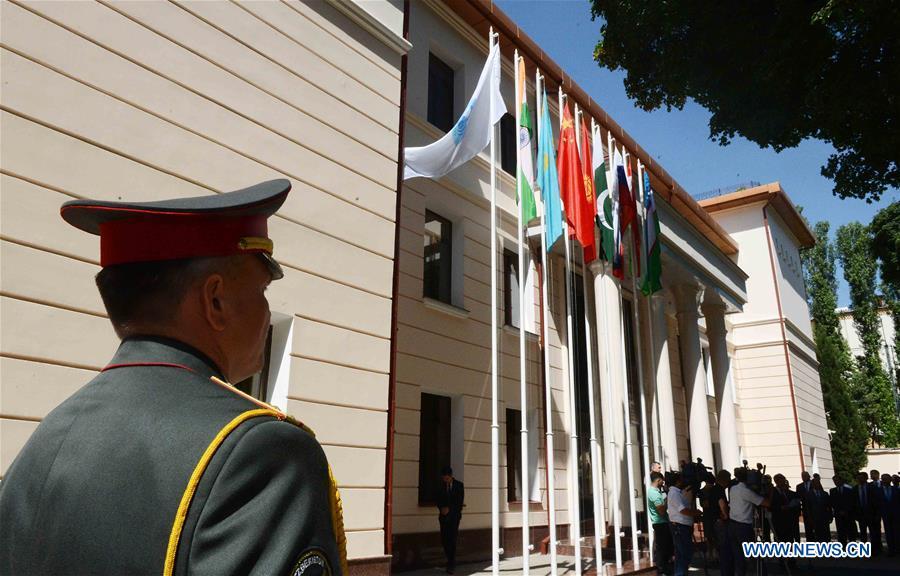 Flags of India and Pakistan are hoisted after they were accepted as full members at Regional Anti-Terrorist Structure of Shanghai Cooperation Organization in Tashkent, Uzbekistan, June 15, 2017. The 18th Shanghai Cooperation Organization (SCO) Summit is scheduled for June 9 to 10 in Qingdao, a coastal city in east China\'s Shandong Province. Since China took over the rotating presidency of the SCO last June, more than 160 activities including a series of important institutional meetings and multilateral events have been held so far. (Xinhua/Sadat)