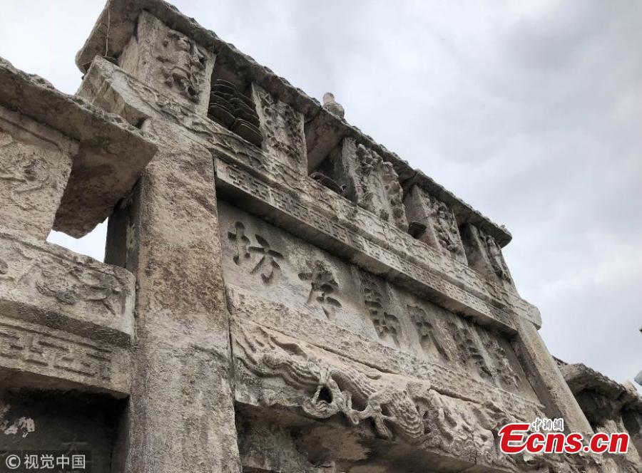 A memorial archway from the Qing Dynasty (1644-1911) has been discovered during renovation work in a community in Guiyang City in Southwest China’s Guizhou Province. The eight-meter-tall, nine-meter-wide structure was originally constructed to honor the filial piety of a woman to her parents-in-law in 1841. The existence of the cultural relic has only recently been publicly known as it was long hidden in a private residence. (Photo/VCG)