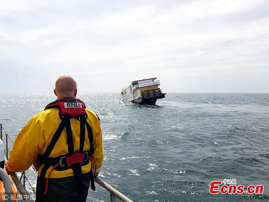 MV Oliver Cromwell, a recently renovated historic paddle steamer, sank 10 miles off South Stack near Holyhead at Anglesey, Wales as it was on its way to its new owner who was set to pay 245,000 pound for it. The Mississippi-style steamer was built as a Dutch barge in 1922 and converted to a riverboat hotel in 1993 travelling between Gloucester and Worcester. (Photo/VCG)