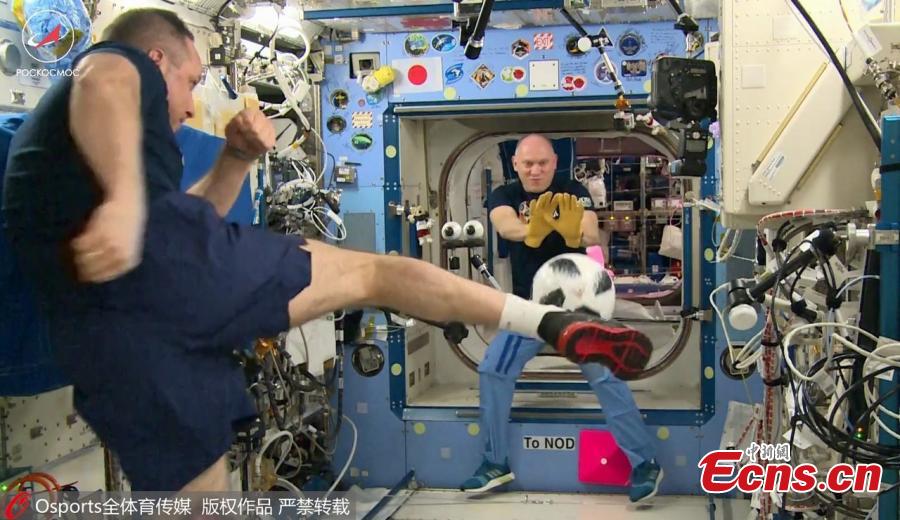 Russian cosmonauts Anton Shkaplerov and Oleg Artemyev have demonstrated their zero-gravity football skills in a cosmic kickabout at the International Space Station (ISS). In a video released by Russian state space agency Roscosmos, the pair took it in turns to fire gravity-defying shots at each other in an orbital training session in honor of the upcoming World Cup in Russia. (Photo/Agencies)