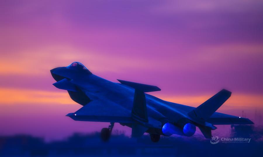 Undated file photo shows China\'s J-20 stealth fighter jet takes off for a night confrontation training mission during a coordinated tactical training exercise with J-16 fighter jets and J-10c fighter jets in an effort to boost the PLA Air Force\'s combat capability. (Photo/eng.chinamil.com.cn)