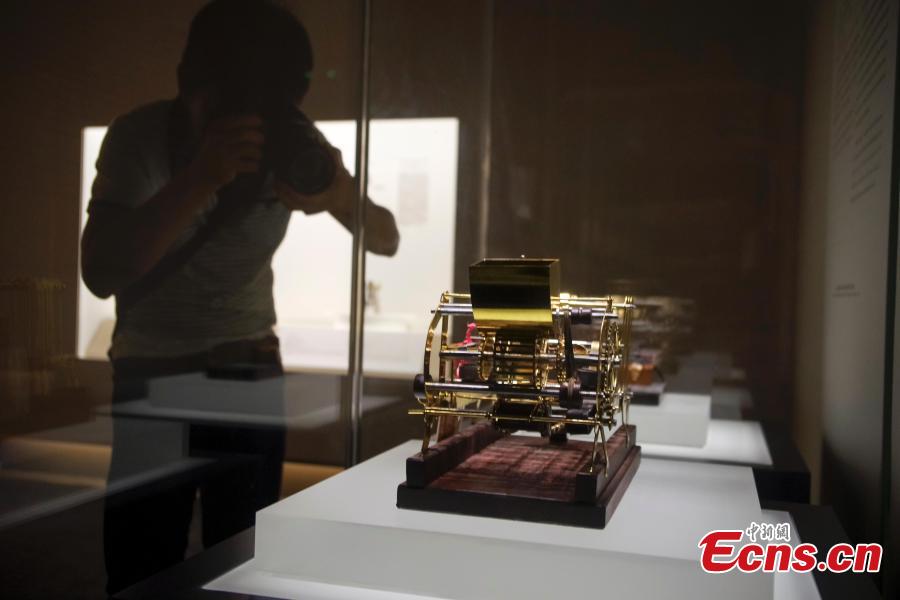 Visitors view items in the Spirit of Invention: Nineteenth-Century U.S. Patent Models from the Hagley Museum and Library exhibition at the National Museum of China in Beijing, June 3, 2018. The exhibition presented 60 of Hagley’s 19th-century patent models. (Photo: China News Service/Jia Tianyong)