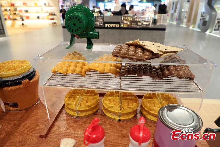 Grizzly, Panda and Ice Bear from Cartoon Network’s We Bare Bears are having their first working holiday at LCX, Ocean Terminal in Hong Kong. Visitors can snap a selfie with them as they visit a famous local teahouse, herbal tea kiosk, traditional grocery store and egg waffles stall. Their visit runs until June 17. (Photo: China News Service/Hong Shaokui)