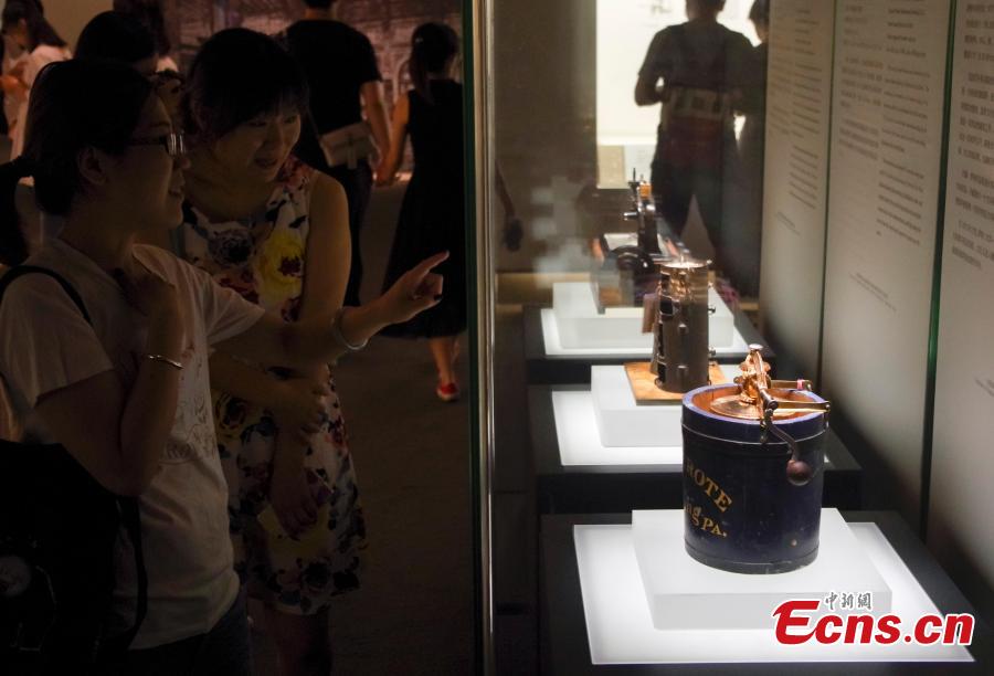 Visitors view items in the Spirit of Invention: Nineteenth-Century U.S. Patent Models from the Hagley Museum and Library exhibition at the National Museum of China in Beijing, June 3, 2018. The exhibition presented 60 of Hagley’s 19th-century patent models. (Photo: China News Service/Jia Tianyong)