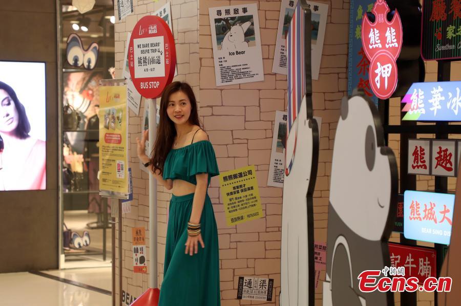 Grizzly, Panda and Ice Bear from Cartoon Network’s We Bare Bears are having their first working holiday at LCX, Ocean Terminal in Hong Kong. Visitors can snap a selfie with them as they visit a famous local teahouse, herbal tea kiosk, traditional grocery store and egg waffles stall. Their visit runs until June 17. (Photo: China News Service/Hong Shaokui)