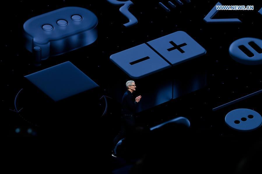 Apple CEO Tim Cook takes the stage during Apple\'s Worldwide Developer Conference (WWDC) at the San Jose Convention Center in San Jose, California, the United States, June 4, 2018. (Xinhua)