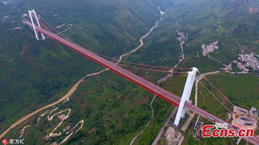 A drone photo shows the Baling River Bridge over a valley in Guanling County, Southwest China’s Guizhou Province, June 5, 2018. At a height of 370 meters above the water, the 1,564-meter-long suspension bridge is the second highest bridge in China and the sixth highest in the world. The bride is unique for having a span of 1,088 meters. (Photo/IC)