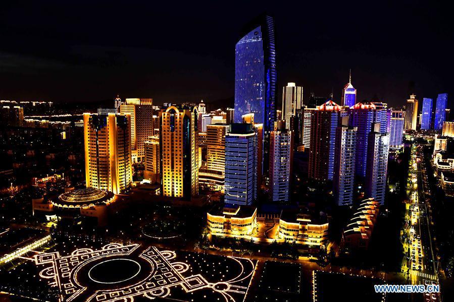 Photo taken on June 2, 2018 shows the night view near Wusi Square in Qingdao, east China\'s Shandong Province. The 18th Shanghai Cooperation Organization (SCO) Summit is scheduled for June 9 to 10 in Qingdao. (Xinhua/Guo Xulei)