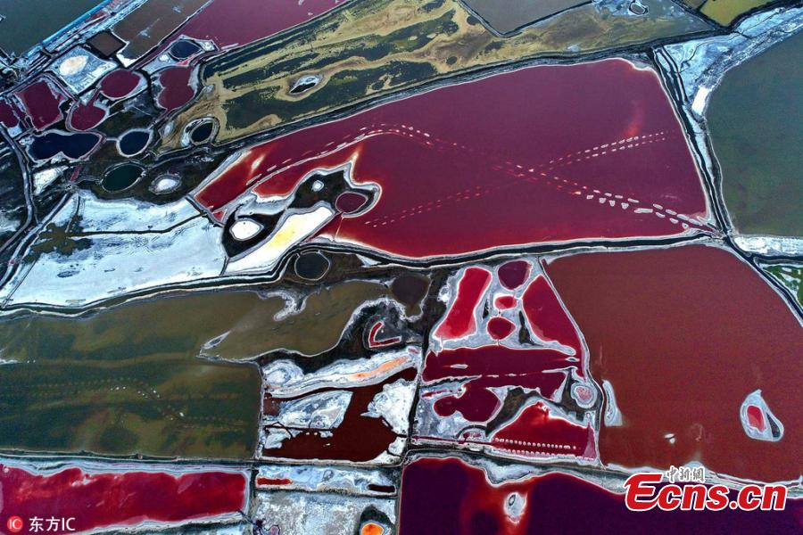 An aerial view of a colorful salt lake in Yuncheng, Shanxi Province, June 6, 2018. Formed approximately 500 million years ago, the salt lake, known as China\'s \