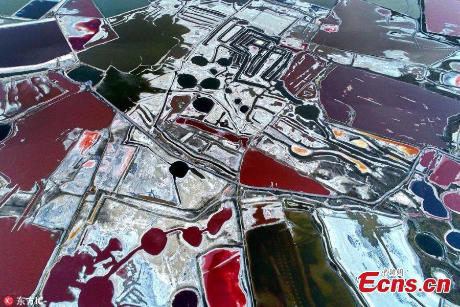 An aerial view of a colorful salt lake in Yuncheng, Shanxi Province, June 6, 2018. Formed approximately 500 million years ago, the salt lake, known as China\'s \