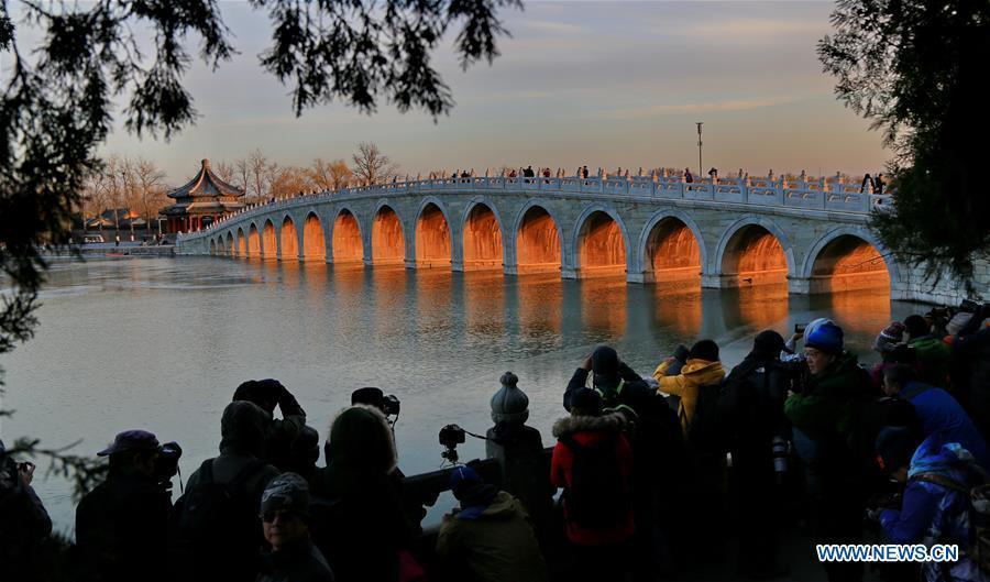 Photo taken on Nov. 29, 2017 shows twilight through the Seventeen Arch Bridge in the Summer Palace in Beijing, capital of China. (Xinhua/Liu Xianguo)

China\'s Cultural and Natural Heritage Day falls on June 9 this year.

More than 3,700 activities will be held across China to celebrate this year\'s cultural and natural heritage day, according to the Ministry of Culture and Tourism.

The Chinese government has approved to designate the second Saturday of every June as the cultural and natural heritage day since last year.

China now has 52 sites inscribed on the UNESCO World Heritage list, which was established to safeguard unique and irreplaceable cultural and natural sites around the world.

Let\'s take a look at 20 cultural heritage sites in China, which may give you some clues on your trips.

You can read more at here.

1. Summer Palace

The Summer Palace, originally named Qingyi Yuan, or the Garden of Clear Ripples, was an imperial garden constructed in 1750 by Emperor Qianlong in a bid to celebrate his mother\'s birthday. During the past few centuries, emperors and empresses spent their leisure time there, which is of great aesthetic value today.

The site in Beijing is an outstanding expression of the creative art of Chinese landscape garden design, incorporating the works of man and nature in a harmonious manner.

The Summer Palace was added to the list in November 1998.