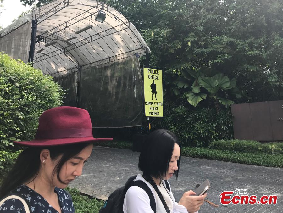A sign for a police check stands near the Capella Resort on Sentosa Island, Singapore, June 10, 2018. (Photo: China News Service/Meng Xiangjun)