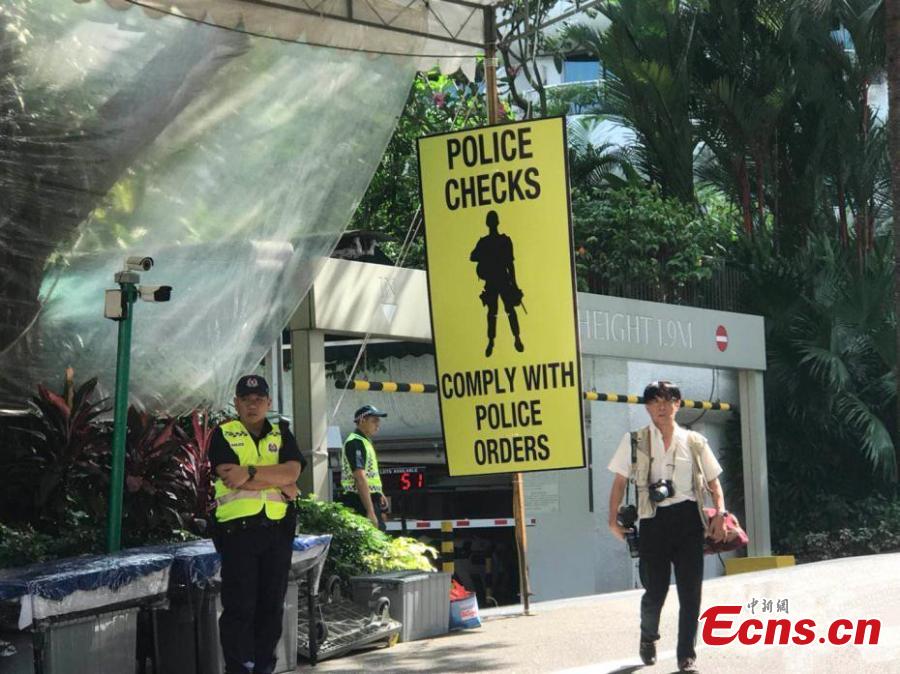 Guards work at the Shangri-La Hotel in Singapore, June 11, 2018. The Singapore government has declared the area surrounding the Shangri-La Hotel a “special event area” for the period of June 10 to 14, for the upcoming summit between United States President Donald Trump and Democratic People\'s Republic of Korea supreme leader Kim Jong-un. (Photo: China News Service/Meng Xiangjun)