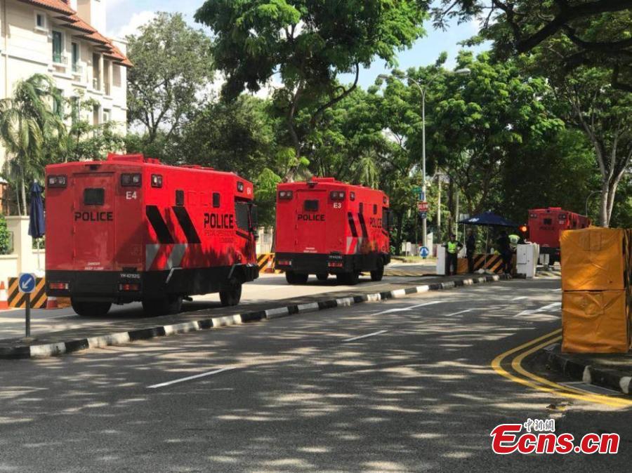 Police cars are seen near the Shangri-La Hotel in Singapore, June 11, 2018. The Singapore government has declared the area surrounding the Shangri-La Hotel a “special event area” for the period of June 10 to 14, for the upcoming summit between United States President Donald Trump and Democratic People\'s Republic of Korea supreme leader Kim Jong-un. (Photo: China News Service/Meng Xiangjun)