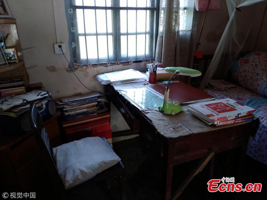 Ye Lianping works in a classroom for left behind children in Maanshan City, East China’s Anhui Province. The retired teacher has volunteered to help students learn English for 18 years. The local government helped renovate a storage area into two rooms where students can finish homework, read books and play chess. Ye said many rural children live with their grandparents after their parents migrated to work in other cities. Despite the generous support for students, Ye is known for his thrift and still lives in a shabby cottage built 30 years ago. (Photo/VCG)