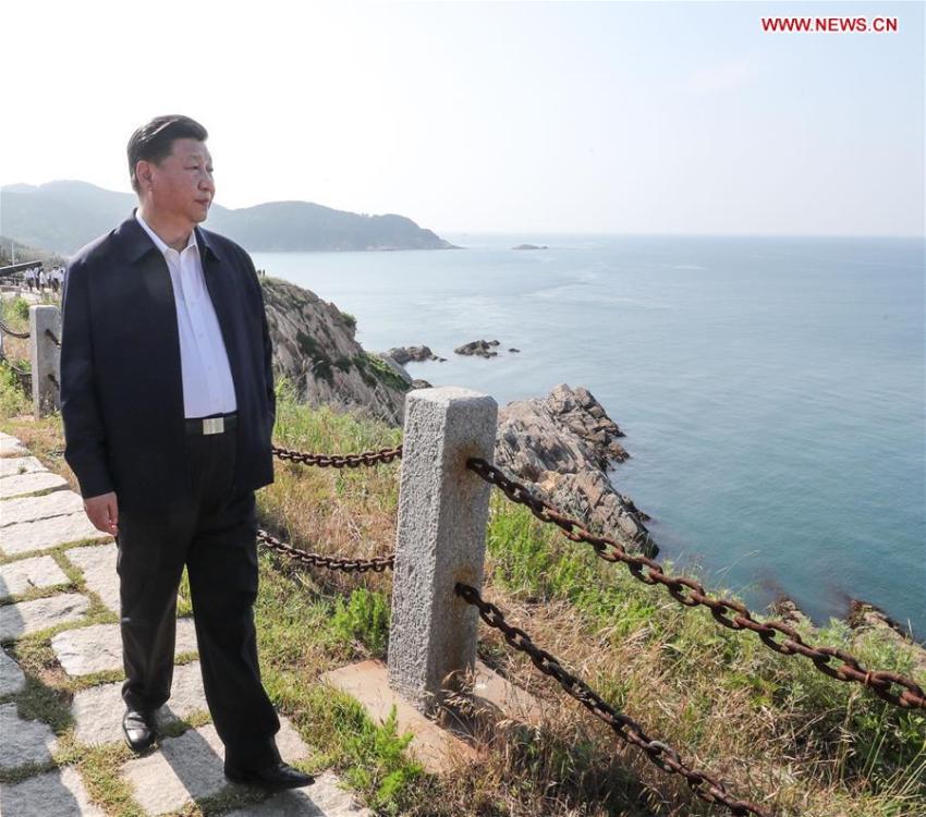 Chinese President Xi Jinping, also general secretary of the Communist Party of China Central Committee and chairman of the Central Military Commission, visits a fort relic site on Liugong Island during an inspection tour in Weihai, east China\'s Shandong Province, June 12, 2018. (Xinhua/Xie Huanchi)