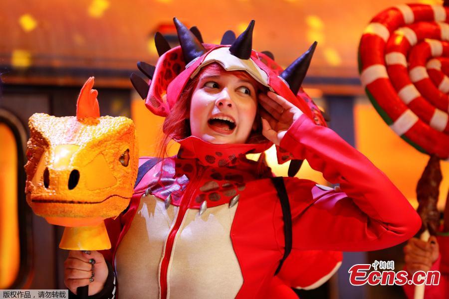 An attendee dresses as a character from the game Fortnite at E3, the world\'s largest video game industry convention in Los Angeles, California, U.S. June 12, 2018. (Photo/Agencies)