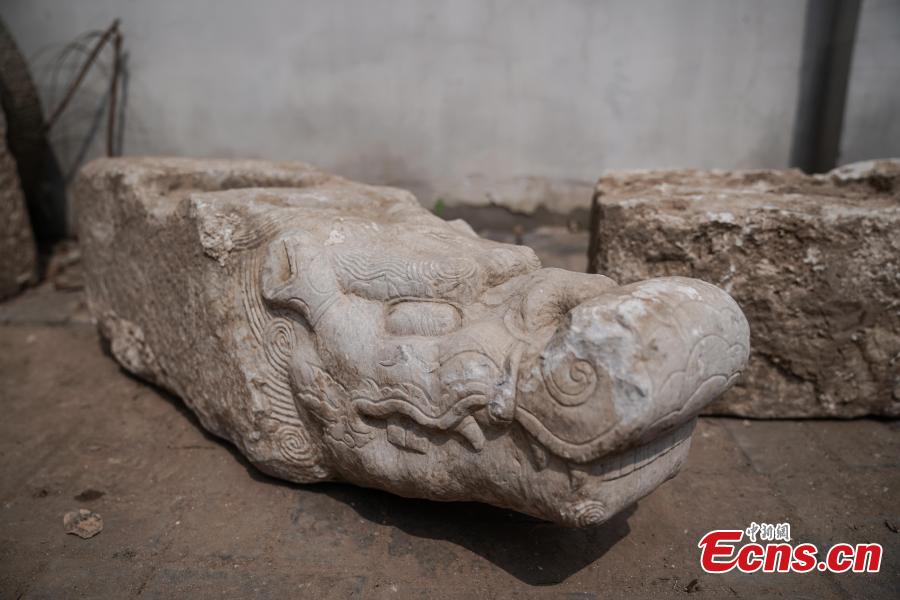 Four white marble building pieces are transported from the Qinghe Sub-district Administration Office in Haidian District, Beijing to the Older Summer Palace for preservation, June 12, 2018. The four cultural relics were found at a construction site in 2017, and experts believe they were originally part of buildings in the Old Summer Palace, a garden for the royal family during the Qing Dynasty (1644-1911) that was known as the \