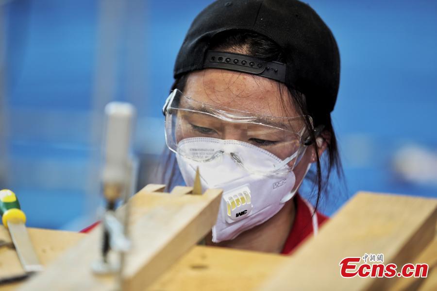 A scene from the WorldSkills China National Competition in Shanghai, June 13, 2018. A total of 897 skilled professionals from across the country will compete in 34 programs including carpentry, floriculture, gem cutting, baking and panel beating. The winners will represent China at the 46th WorldSkills Competition in 2021. WorldSkills aims to raise the profile and recognition of skilled people and show how important skills are in achieving economic growth and personal success, according to its official website. (Photo: China News Service/Zhang Hengwei)