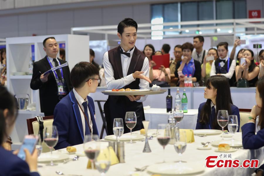 A scene from the WorldSkills China National Competition in Shanghai, June 13, 2018. A total of 897 skilled professionals from across the country will compete in 34 programs including carpentry, floriculture, gem cutting, baking and panel beating. The winners will represent China at the 46th WorldSkills Competition in 2021. WorldSkills aims to raise the profile and recognition of skilled people and show how important skills are in achieving economic growth and personal success, according to its official website. (Photo: China News Service/Zhang Hengwei)