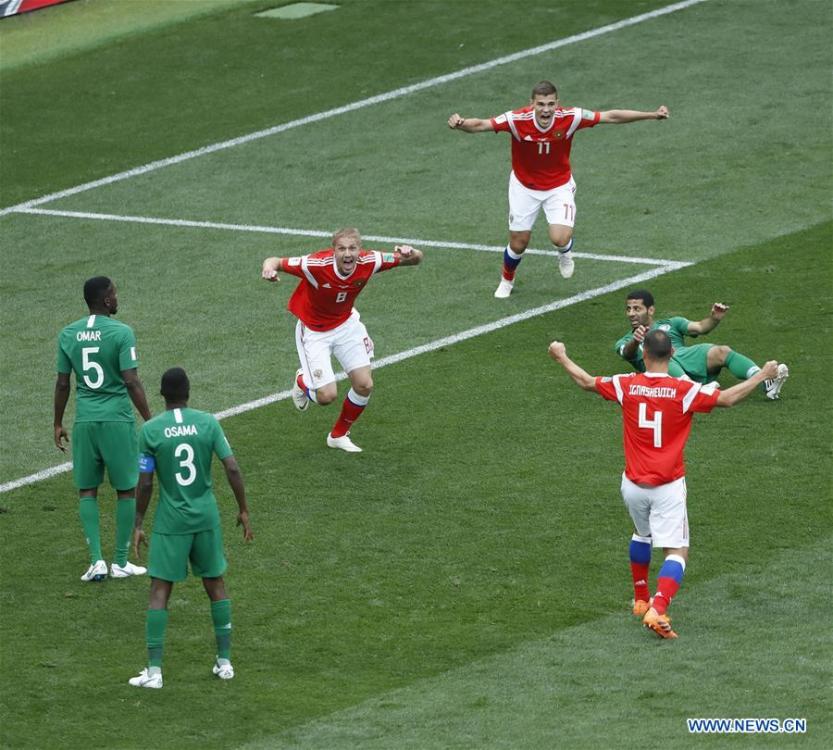 Russia\'s Iury Gazinsky (C) celebrates his first goal during the opening match of the 2018 FIFA World Cup in Moscow, Russia, on June 14, 2018. (Xinhua/Cao Can)