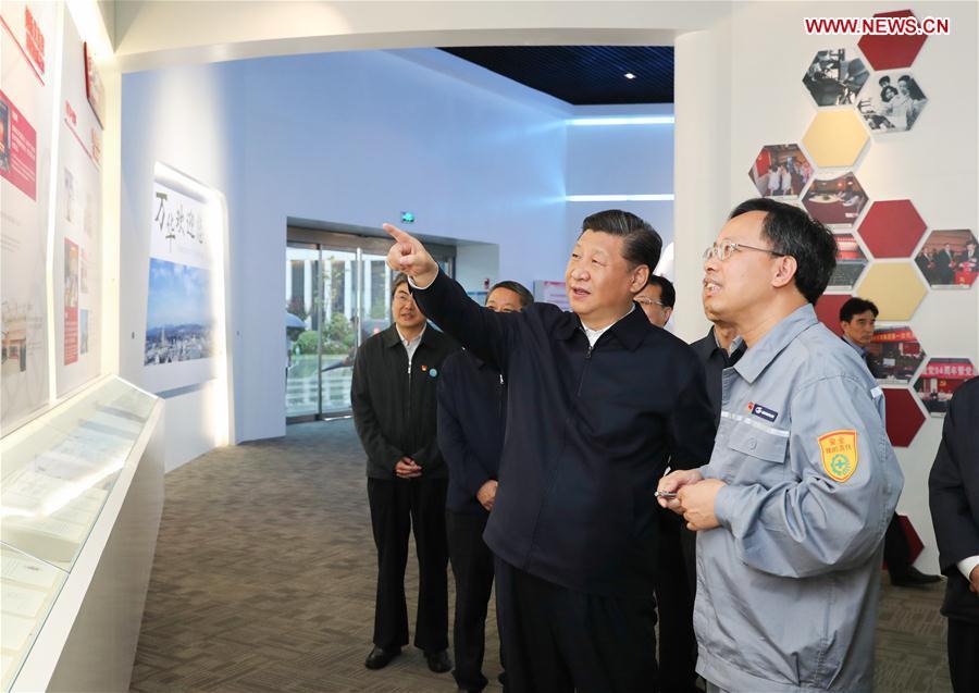Chinese President Xi Jinping, also general secretary of the Communist Party of China Central Committee and chairman of the Central Military Commission, visits an industrial park of Wanhua Chemical during an inspection tour in Yantai, east China\'s Shandong Province, June 13, 2018. (Xinhua/Xie Huanchi)