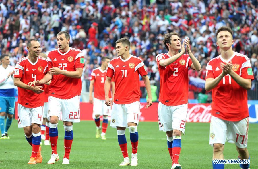 Russia\'s players celebrate their victory against Saudi Arabia during the opening match of the 2018 FIFA World Cup in Moscow, Russia, on June 14, 2018. Russia won 5-0. (Xinhua/Yang Lei)