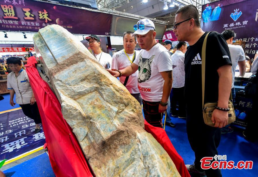 Rare stones are on display at an exhibition center in Urumqi, capital of northwest China\'s Xinjiang Uygur Autonomous Region, June 15, 2018. (Photo: China News Service/Liu Xin)