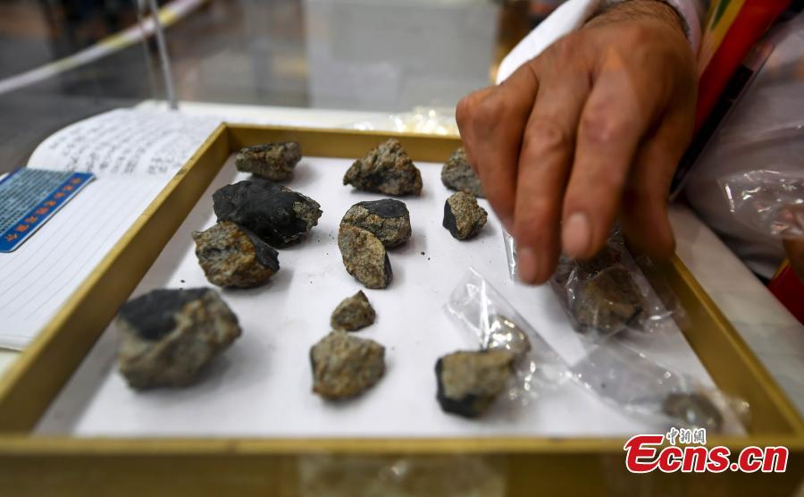 Rare stones are on display at an exhibition center in Urumqi, capital of northwest China\'s Xinjiang Uygur Autonomous Region, June 15, 2018. (Photo: China News Service/Liu Xin)