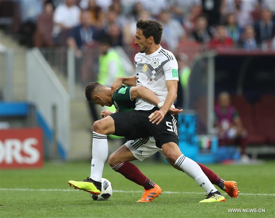 Mats Hummels (front) of Germany vies with Javier Hernandez of Mexico during a group F match between Germany and Mexico at the 2018 FIFA World Cup in Moscow, Russia, June 17, 2018. (Xinhua/Xu Zijian)