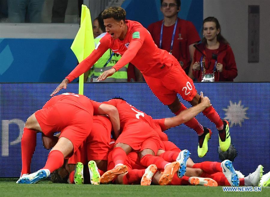 Players of England celebrate scoring during a group G match between Tunisia and England at the 2018 FIFA World Cup in Volgograd, Russia, June 18, 2018. (Xinhua/Liu Dawei)