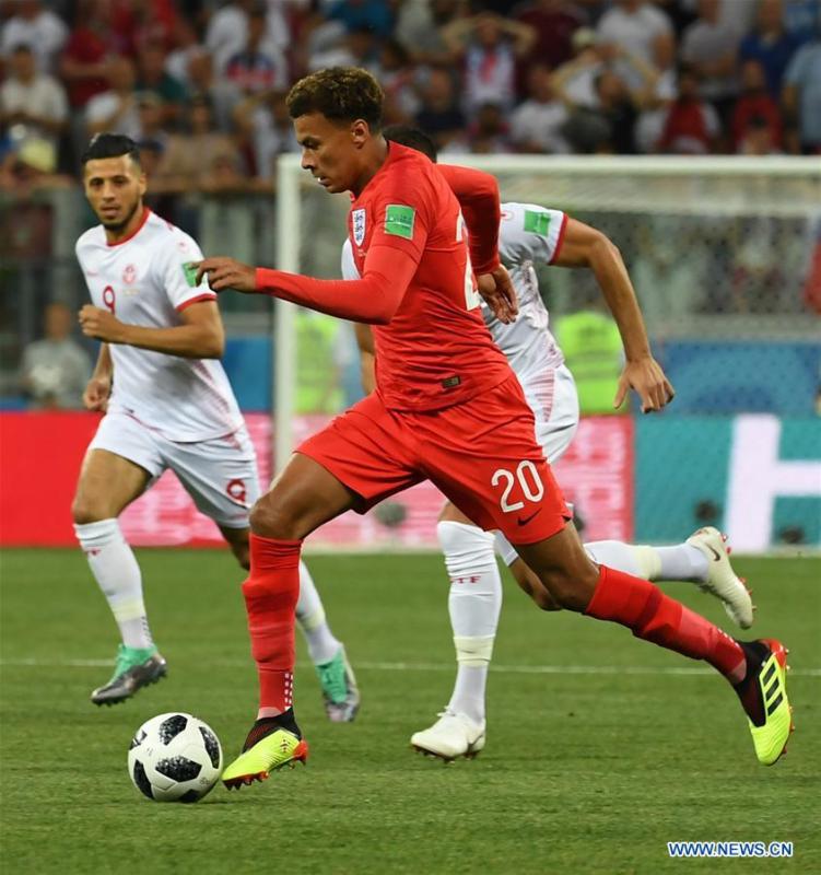 Dele Alli (front) of England competes during a group G match between Tunisia and England at the 2018 FIFA World Cup in Volgograd, Russia, June 18, 2018. (Xinhua/Chen Cheng)