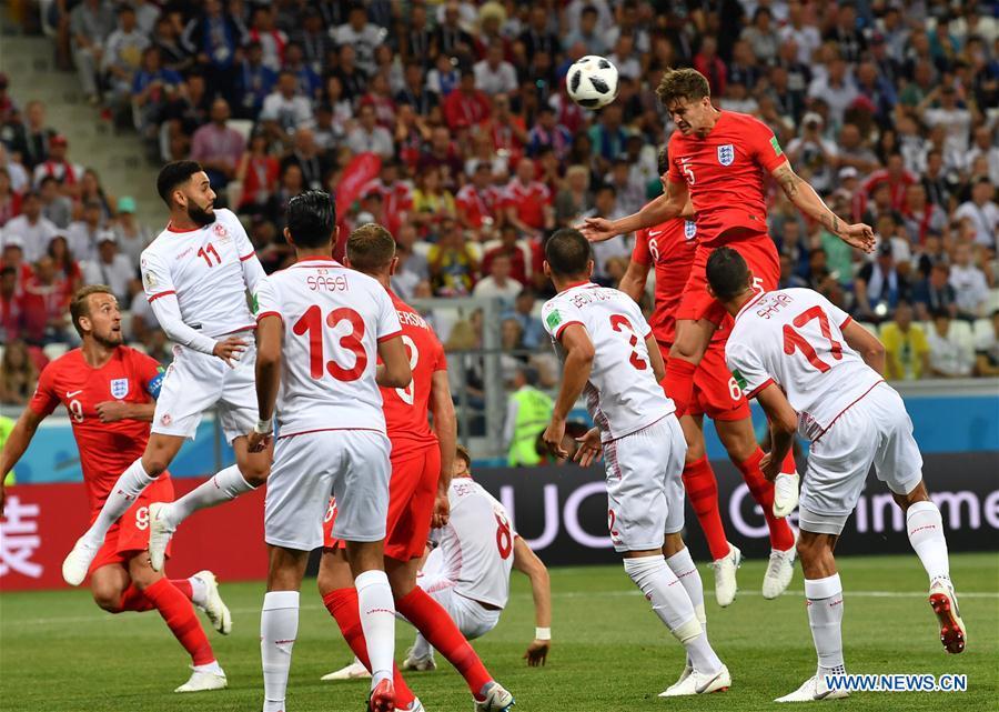 John Stones (R top) of England competes during a group G match between Tunisia and England at the 2018 FIFA World Cup in Volgograd, Russia, June 18, 2018. (Xinhua/Chen Cheng)