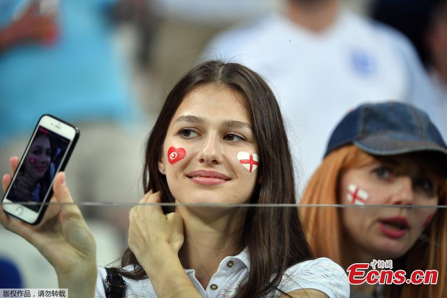 A fan during the match between Tunisia and England in Volgograd Arena, Volgograd, Russia, June 18, 2018. (Photo: China News Service/Mao Jianjun)