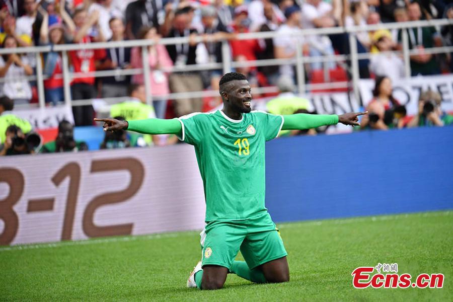 Senegal\'s M\'Baye Niang celebrates scoring a goal during a match against Poland in Spartak Stadium, Moscow, Russia, June 19, 2018. Senegal recorded the first African win at the 2018 World Cup when they beat Poland 2-1 on Tuesday thanks to a deflected Thiago Cionek own goal and a terrible error by Polish \'keeper Wojciech Szczesny. (Photo: China News Service/Mao Jianjun)