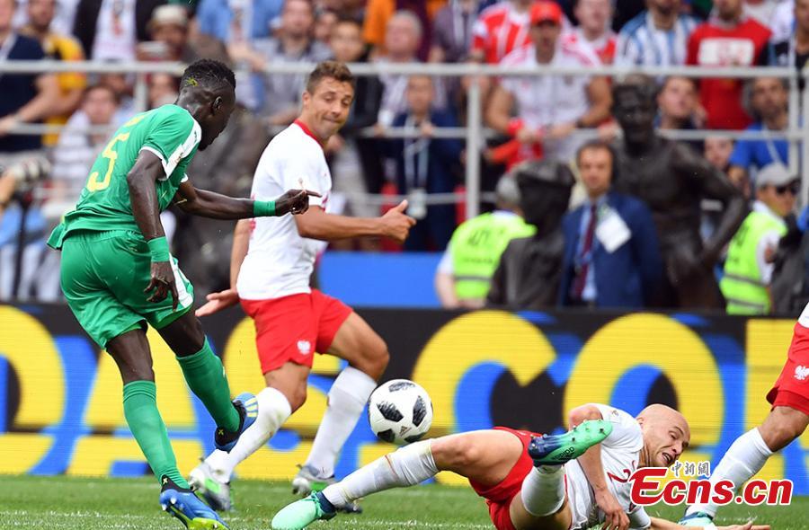 A match between Senegal and Poland in Group H of the World Cup in Spartak Stadium, Moscow, Russia, June 19, 2018. Senegal recorded the first African win at the 2018 World Cup when they beat Poland 2-1 on Tuesday thanks to a deflected Thiago Cionek own goal and a terrible error by Polish \'keeper Wojciech Szczesny. (Photo: China News Service/Mao Jianjun)