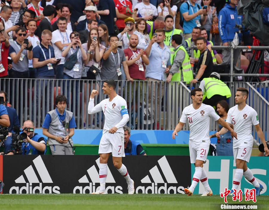 Portugal\'s Cristiano Ronaldo celebrates scoring their goal against Morocco in a Group B match at Luzhniki Stadium, Moscow, Russia, June 20, 2018. (Photo: China News Service/Mao Jianjun)