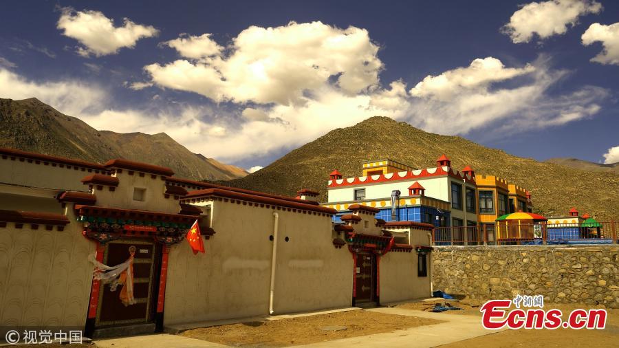 A view of newly built homes for relocated residents in Doilungdeqen District, Lhasa City, Southwest China’s Tibet Autonomous Region, June 20, 2018. Residents who once lived in Rongma Township of Nyima County, which averages 5,000 meters above sea level and faces difficulties in poverty alleviation, have been relocated to new homes at an altitude of 3,800 meters. The ecological relocation stretching more than 1,000 kilometers can also help conserve wild animals on the Northern Tibet Plateau. (Photo/VCG)