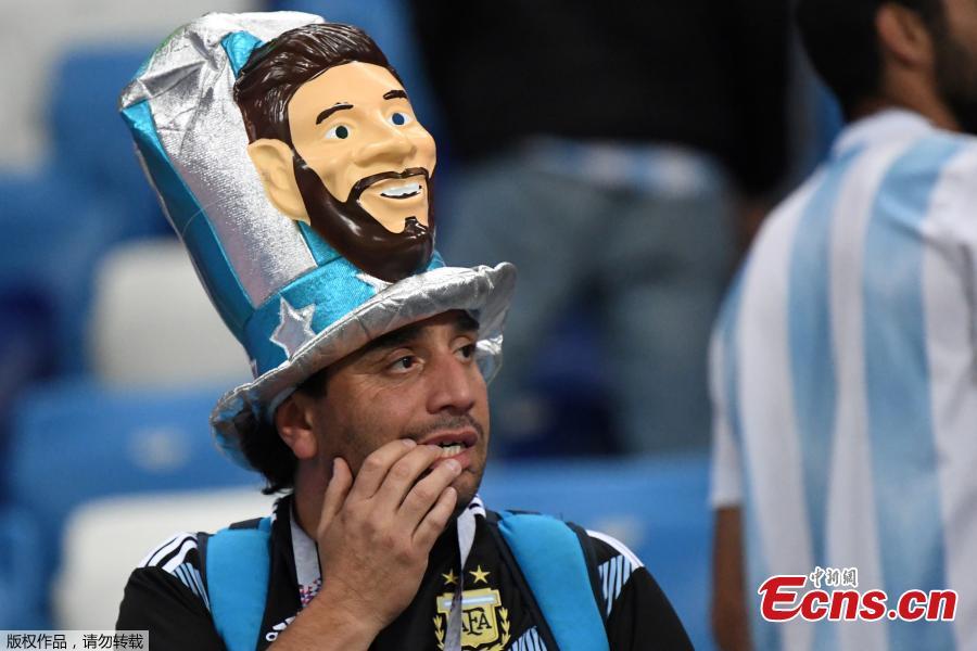 An Argentina fan looks dejected after the match between Argentina and Croatia in Nizhny Novgorod Stadium, Nizhny Novgorod, Russia, June 21, 2018. Croatia stunned Argentina 3-0 to advance to the group stage of the World Cup. (Photo/Agencies)