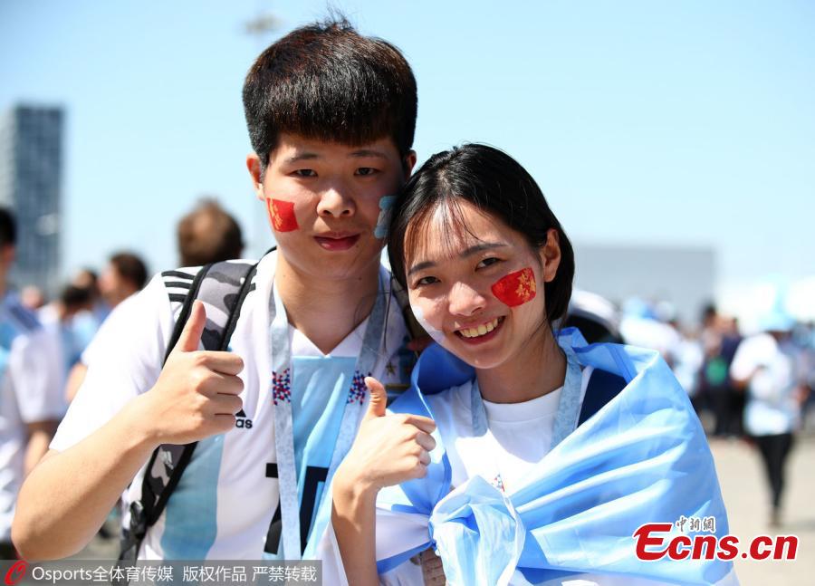 Chinese fans are seen in Russia to cheer for their favorite team at the 2018 FIFA World Cup. (Photo/Osports)