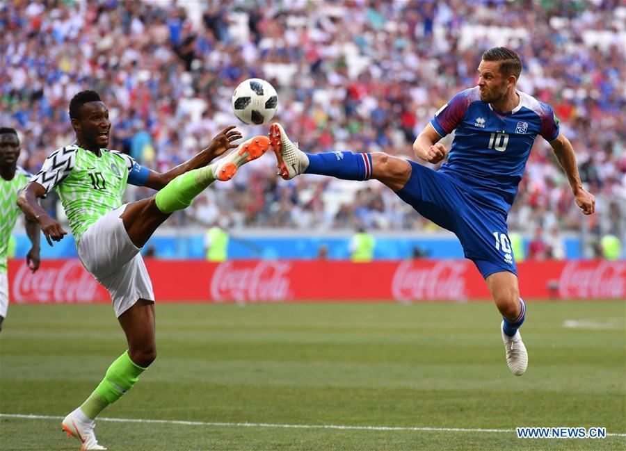 Gylfi Sigurdsson (R) of Iceland vies with John Obi Mikel of Nigeria during the 2018 FIFA World Cup Group D match between Nigeria and Iceland in Volgograd, Russia, June 22, 2018. (Xinhua/Lui Siu Wai)
