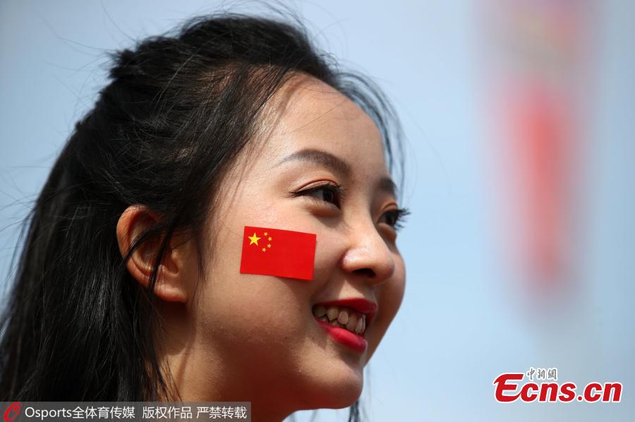 A Chinese fan is seen in Russia to cheer for their favorite team at the 2018 FIFA World Cup. (Photo/Osports)