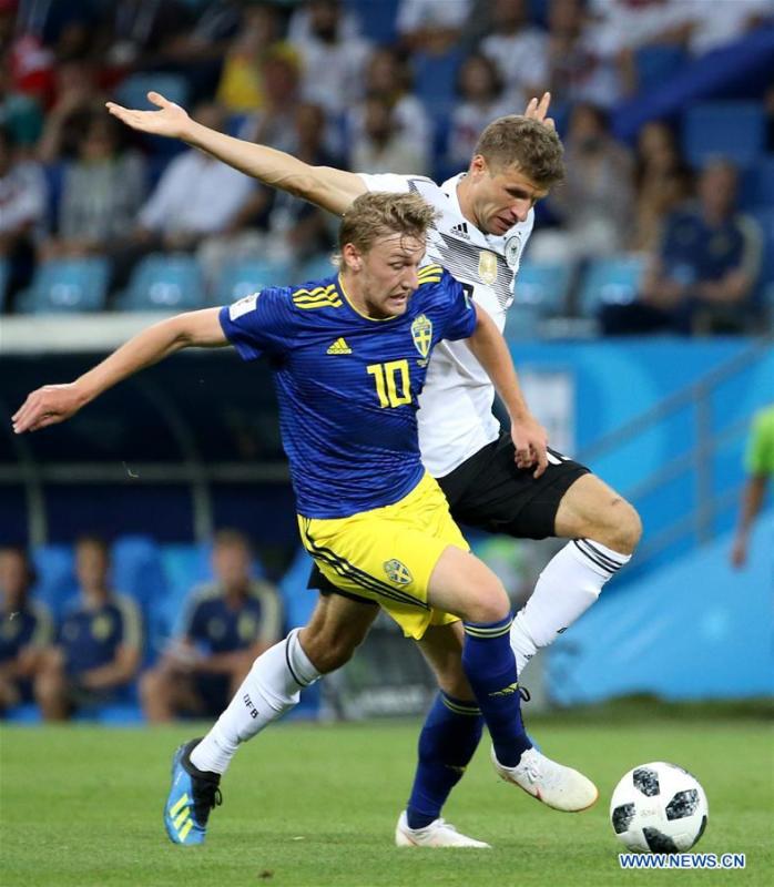 Thomas Mueller (R) of Germany vies with Emil Forsberg of Sweden during the 2018 FIFA World Cup Group F match between Germany and Sweden in Sochi, Russia, June 23, 2018. (Xinhua/Li Ming)