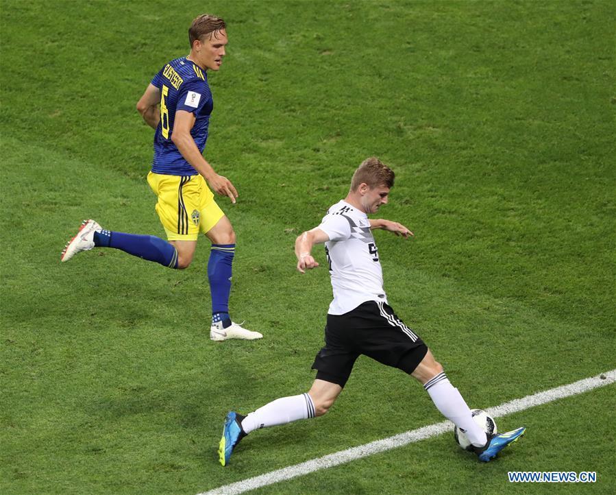 Timo Werner (bottom) of Germany vies with Ludwig Augustinsson of Sweden during the 2018 FIFA World Cup Group F match between Germany and Sweden in Sochi, Russia, June 23, 2018. (Xinhua/Ye Pingfan)